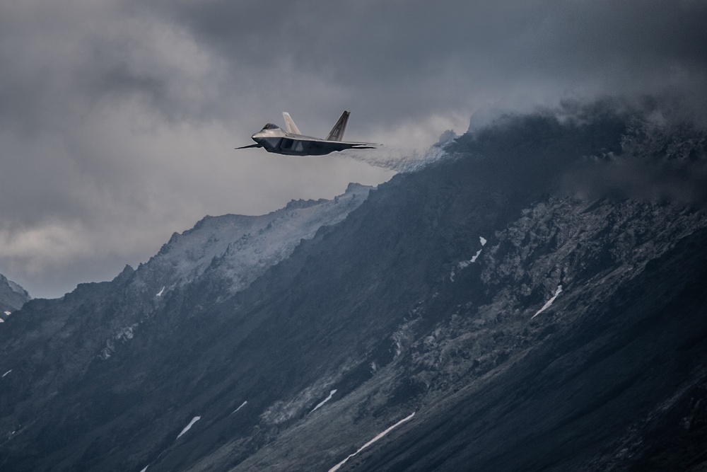 F-22 Rages Across Alaskan Mountain Range