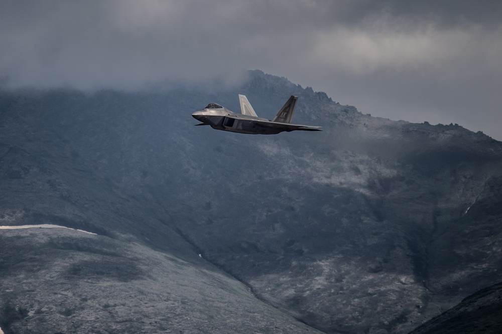 F-22 Rages Across Alaskan Mountain Range