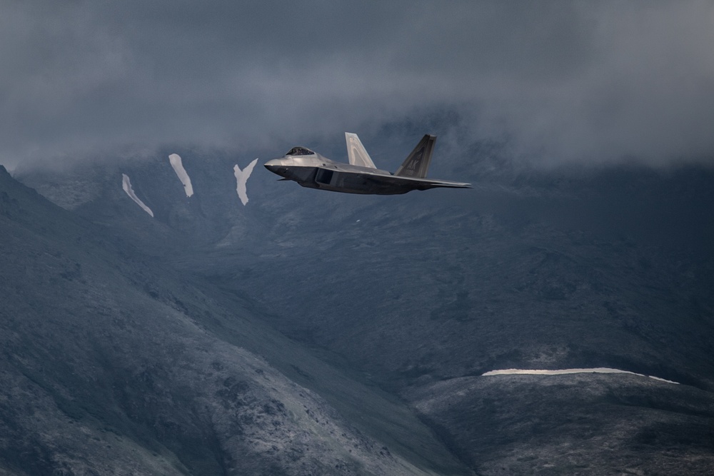 F-22 Rages Across Alaskan Mountain Range