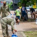 CFAS Sailors Clean Sidewalk