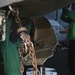 U.S. Navy Sailors Conduct Maintenance on Fighter Jet