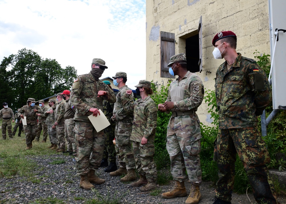 NATO combat medics participate in International Combat Lifesaver course