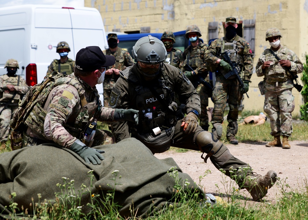 NATO combat medics participate in International Combat Lifesaver course