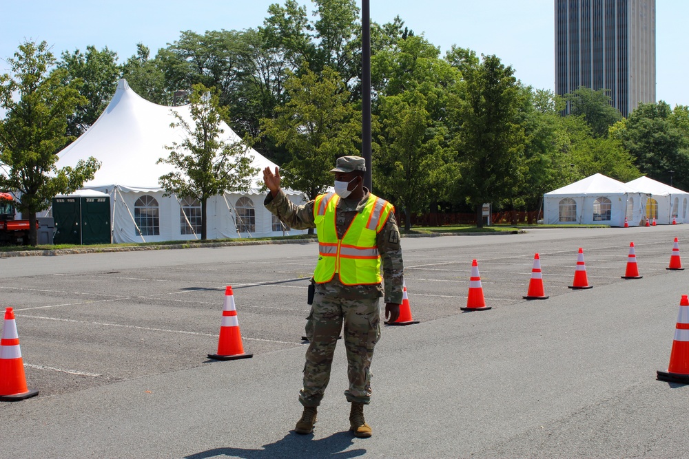 Soldier Directs Traffic at a COVID19 Drive-Thru Test Site