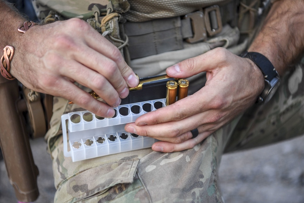 Task Force Guardian members train with sniper rifles