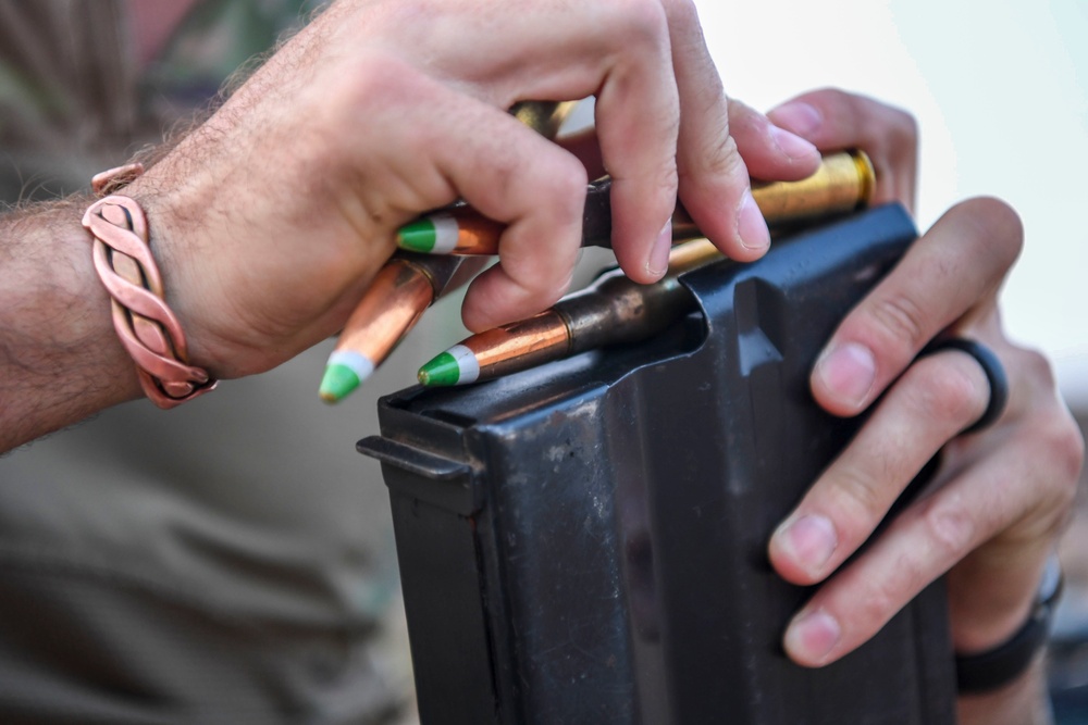 Task Force Guardian members train with sniper rifles