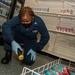 U.S Sailor works in ship store
