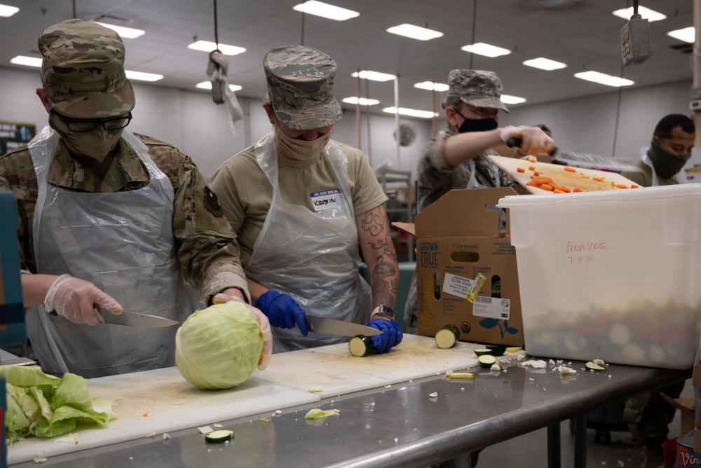 AZ National Guard help prepare meals for local homeless