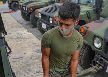 Get It Done | Marines with 3rd MLG tow a HMMWV