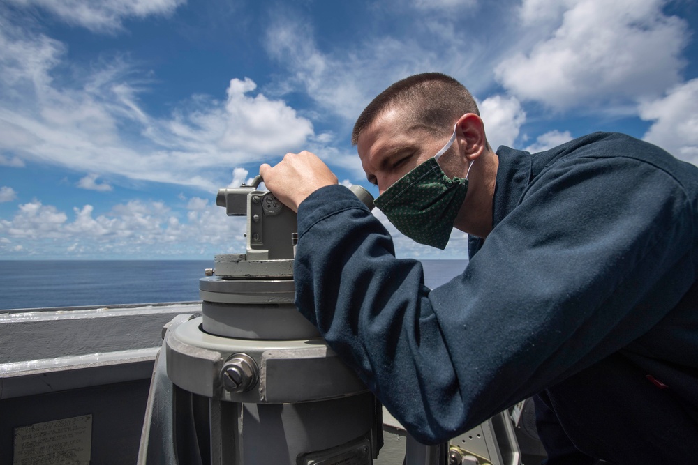 USS Ralph Johnson Conducts Maritime Operations Near Spratly Islands