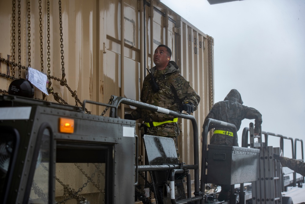 Dover AFB loads cargo during Tropical Storm Fay