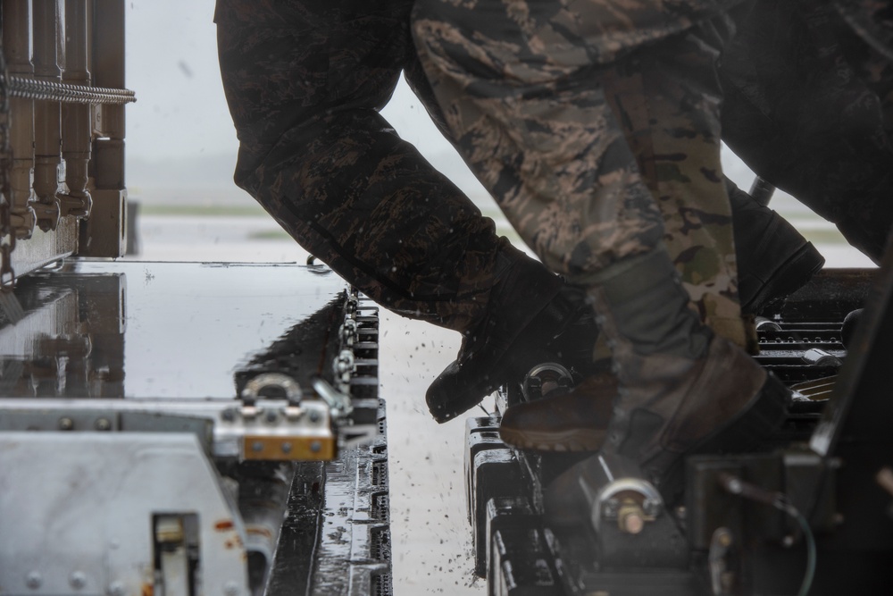 Dover AFB loads cargo during Tropical Storm Fay