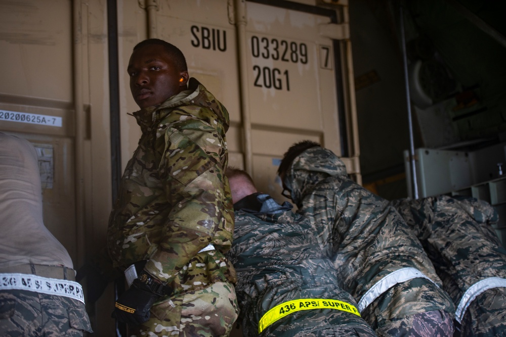 Dover AFB loads cargo during Tropical Storm Fay