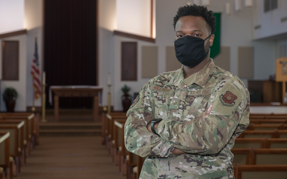 A 509th Bomb Wing Religious Affairs Airman stands in the Spirit Chapel sanctuary