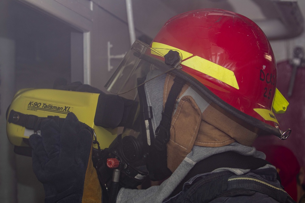 Sailors take part in fire fighting drills