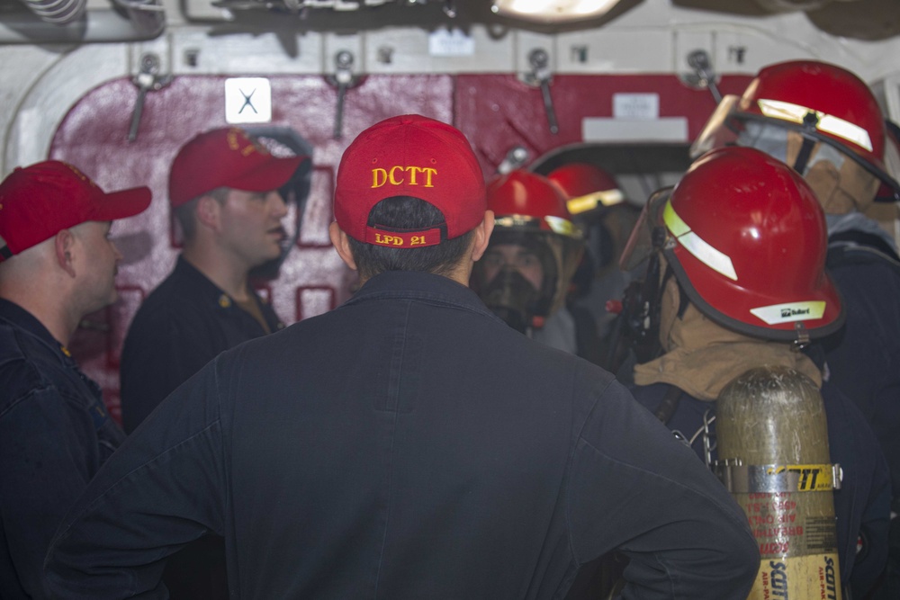 Sailors take part in fire fighting drills