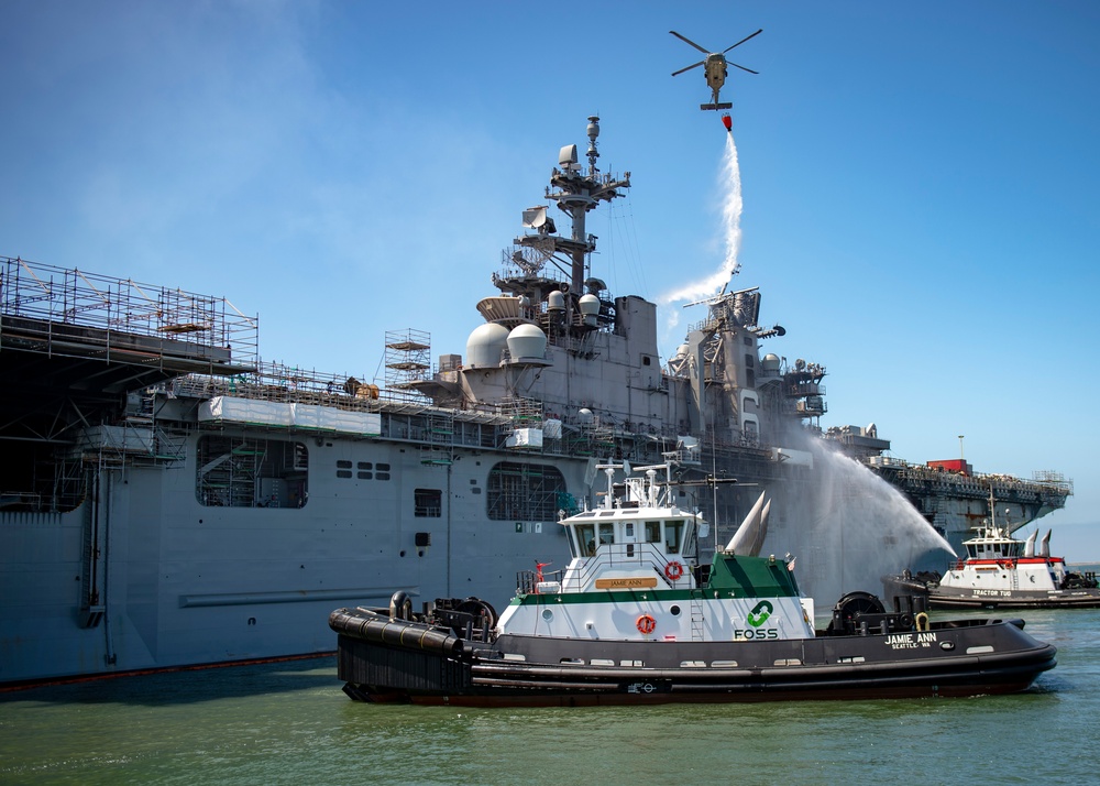 Sailors and Federal San Diego Firefighters fight fire aboard USS Bonhomme Richard