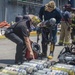 Sailors and Federal San Diego Firefighters fight fire aboard USS Bonhomme Richard