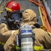 Sailors and Federal San Diego Firefighters fight fire aboard USS Bonhomme Richard