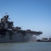 Sailors and Federal San Diego Firefighters fight fire aboard USS Bonhomme Richard
