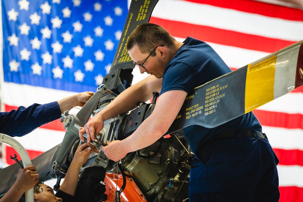 Alaska-based aircrews conduct aircraft maintenance