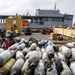 Sailors and Federal San Diego Firefighters fight fire aboard USS Bonhomme Richard