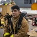 Sailors and Federal San Diego Firefighters fight fire aboard USS Bonhomme Richard