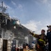 Sailors and Federal San Diego Firefighters fight fire aboard USS Bonhomme Richard