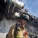 Sailors and Federal San Diego Firefighters fight fire aboard USS Bonhomme Richard