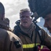 Sailors and Federal San Diego Firefighters fight fire aboard USS Bonhomme Richard