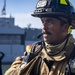 Sailors and Federal San Diego Firefighters fight fire aboard USS Bonhomme Richard