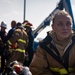 Sailors and Federal San Diego Firefighters fight fire aboard USS Bonhomme Richard