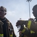 Sailors and Federal San Diego Firefighters fight fire aboard USS Bonhomme Richard