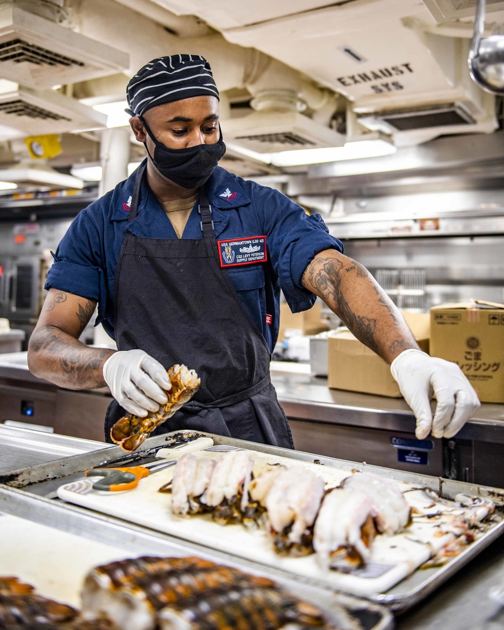 Culinary Specialists aboard USS Germantown (LSD 42) Prepare Dinner for the Crew