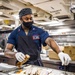 Culinary Specialists aboard USS Germantown (LSD 42) Prepare Dinner for the Crew