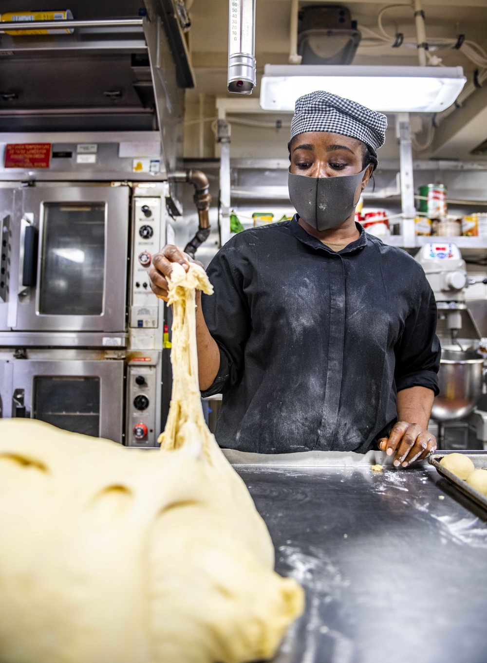 Culinary Specialists aboard USS Germantown (LSD 42) Prepare Dinner for the Crew