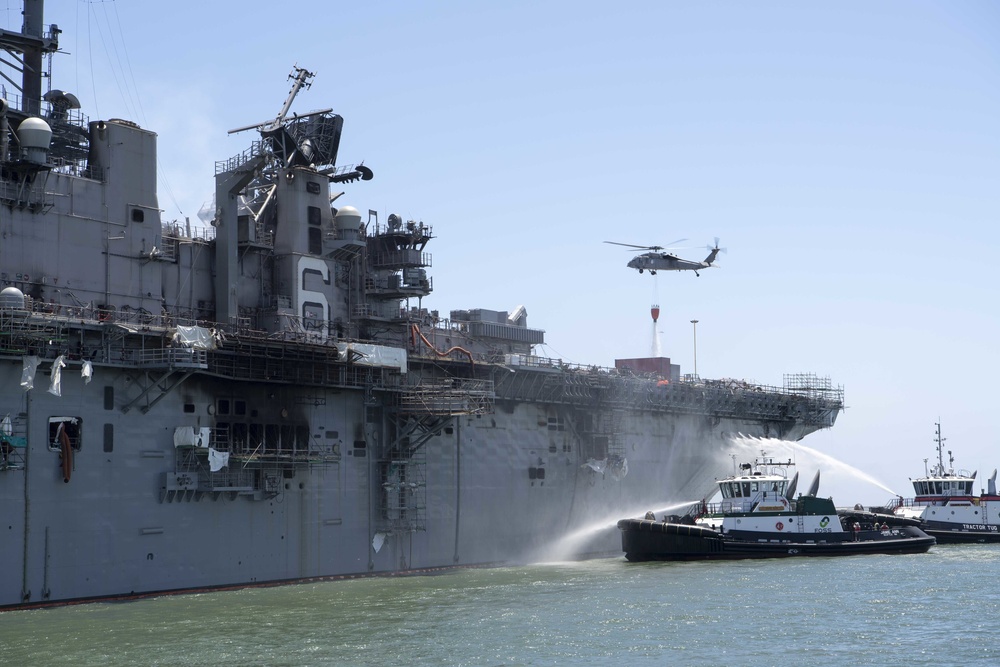 Sailors and Federal San Diego Firefighters fight fire aboard USS Bonhomme Richard