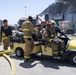 Sailors and Federal San Diego Firefighters fight fire aboard USS Bonhomme Richard