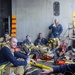 Sailors and federal San Diego firefighters fight fire aboard USS Bonhomme Richard