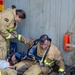 Sailors and federal San Diego firefighters fight fire aboard USS Bonhomme Richard