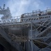 Sailors and federal San Diego firefighters fight fire aboard USS Bonhomme Richard