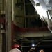 Sailors and federal San Diego firefighters fight fire aboard USS Bonhomme Richard