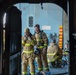 Sailors and federal San Diego firefighters fight fire aboard USS Bonhomme Richard