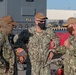 Sailors and federal San Diego firefighters fight fire aboard USS Bonhomme Richard