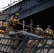 Sailors and Federal San Diego Firefighters fight fire aboard USS Bonhomme Richard