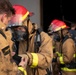 Sailors and Federal San Diego Firefighters fight fire aboard USS Bonhomme Richard