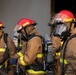 Sailors and Federal San Diego Firefighters fight fire aboard USS Bonhomme Richard