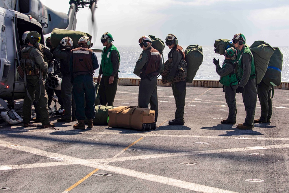 Sailors and Marines take part in flight operations