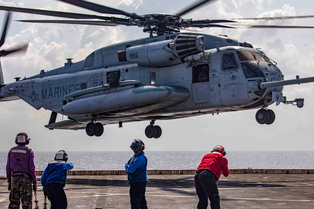 Sailors and Marines take part in flight operations