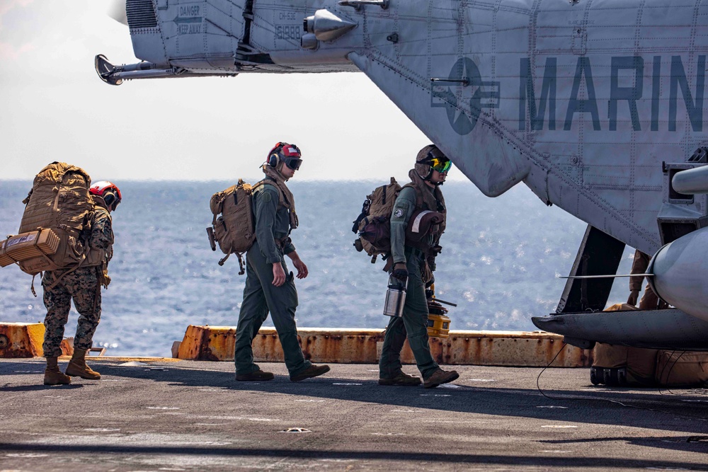 Sailors and Marines take part in flight operations